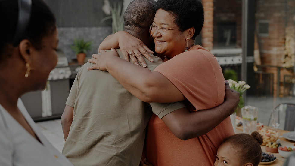 Family members embracing at meal time